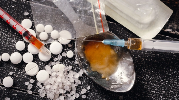 Meth and Xanax - A Risky Combo Image of Xanax pills along side crystal meth and liquid meth - Meth and Xanax - A Risky Combo