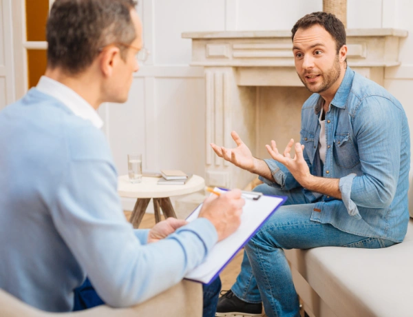Psychotherapist preparing personalized guidance during TSF therapy session