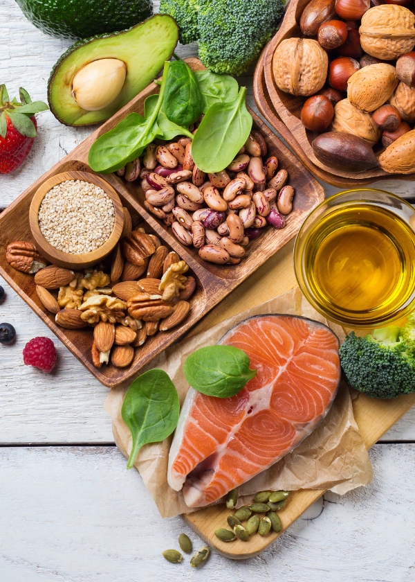 Healthy Fats and Fatty Acids for Healthy Diet in Addiction Recovery Image of nuts, vegetables, fish, and oils with Healthy Fats and Fatty Acids ideal for a Healthy Diet in Addiction Recovery