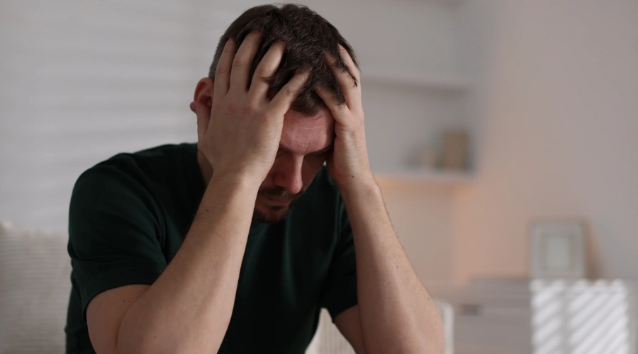 Image of a depressed man, displaying  mental health struggles linked to frequent cocaine use