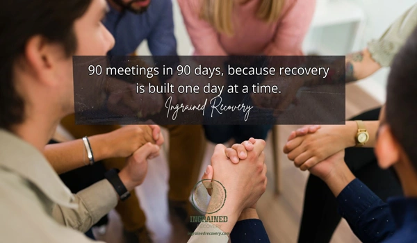 90 in 90 AA and NA - Ingrained Recovery Image of men and women in a circle at a recovery meeting - 90 in 90 AA and NA - Ingrained Recovery
