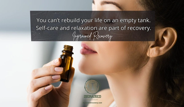 Essential Oils for Addiction Recovery - Ingrained Recovery Image of a woman sniffing Essential Oils for Addiction Recovery - Ingrained Recovery