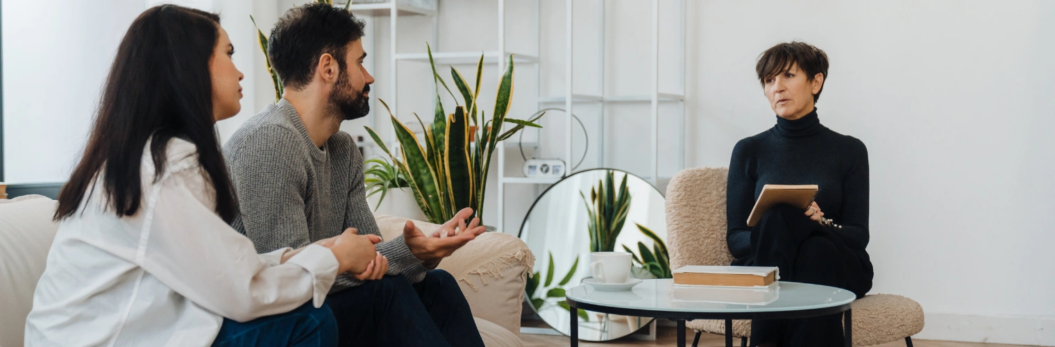 Can Addiction and Marriage Co-Exist - Ingrained Recovery Image of a couple in therapy with a counselor - Can Addiction and Marriage Co-Exist - Ingrained Recovery