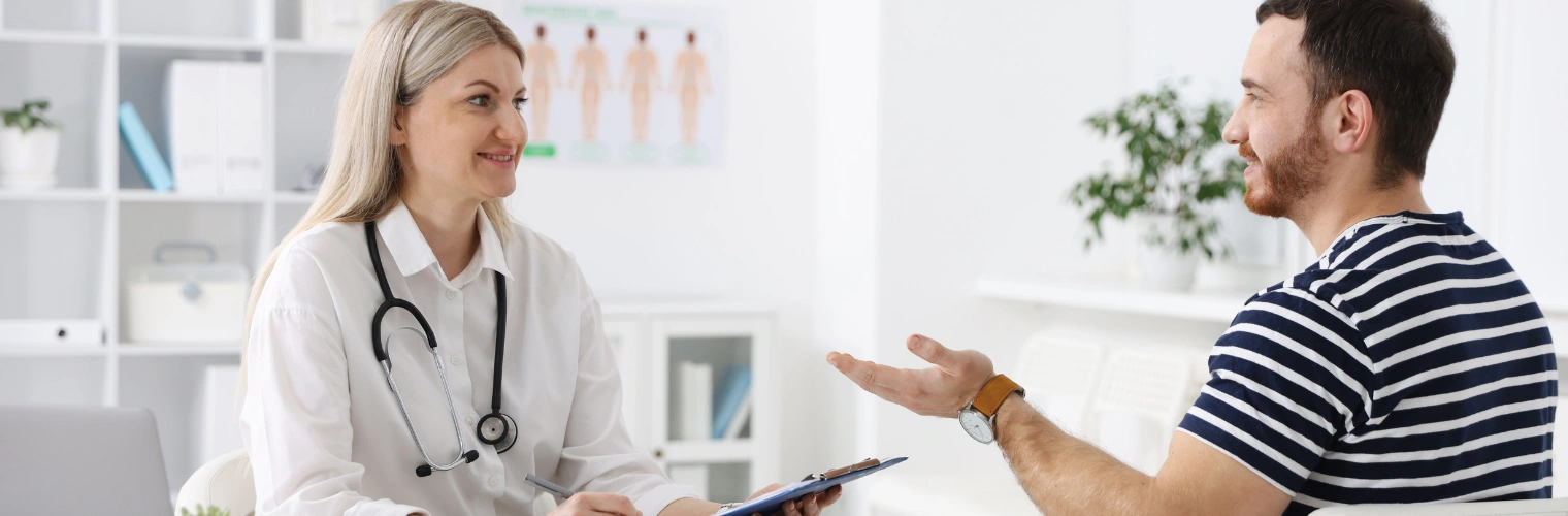 Image of a person seeking professional rehab help for gabapentin and Xanax dependence Image of a man talking to a clinician and seeking professional rehab help for gabapentin and Xanax dependence