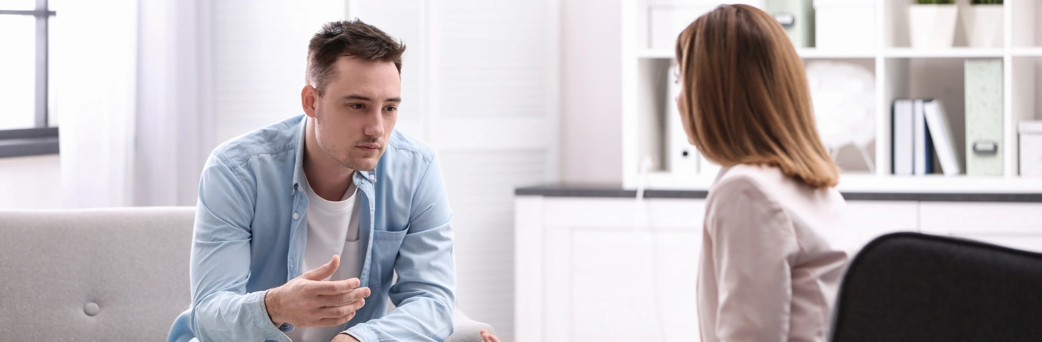 Image of a man in therapy talking to his counselor at Ingrained Recovery Image of a man in therapy talking to his counselor - Failure to Launch Residential Programs at Ingrained Recovery
