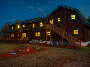 ingrained-recovery-main-building-at-night The main building of Ingrained Recovery lit by moonlight with landscaped front lawn