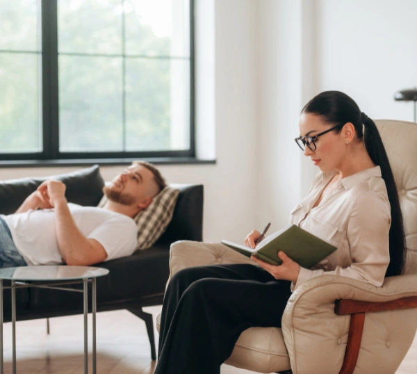 Image of individual therapy as part of comprehensive addiction treatment and mental health care Image of a patient and counselor in individual therapy as part of comprehensive addiction treatment and mental health care