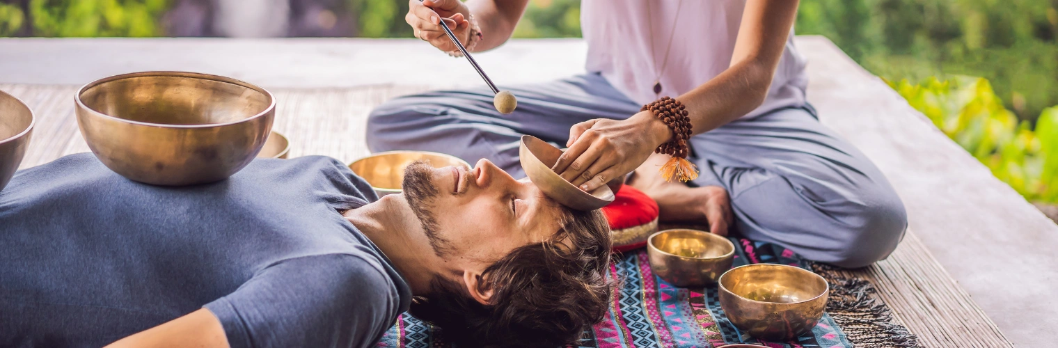 Image of sound healing session promoting relaxation and stress relief during addiction treatment Image of sound healing session promoting relaxation and stress relief during addiction treatment - Sound Therapy for Addiction - Ingrained Recovery