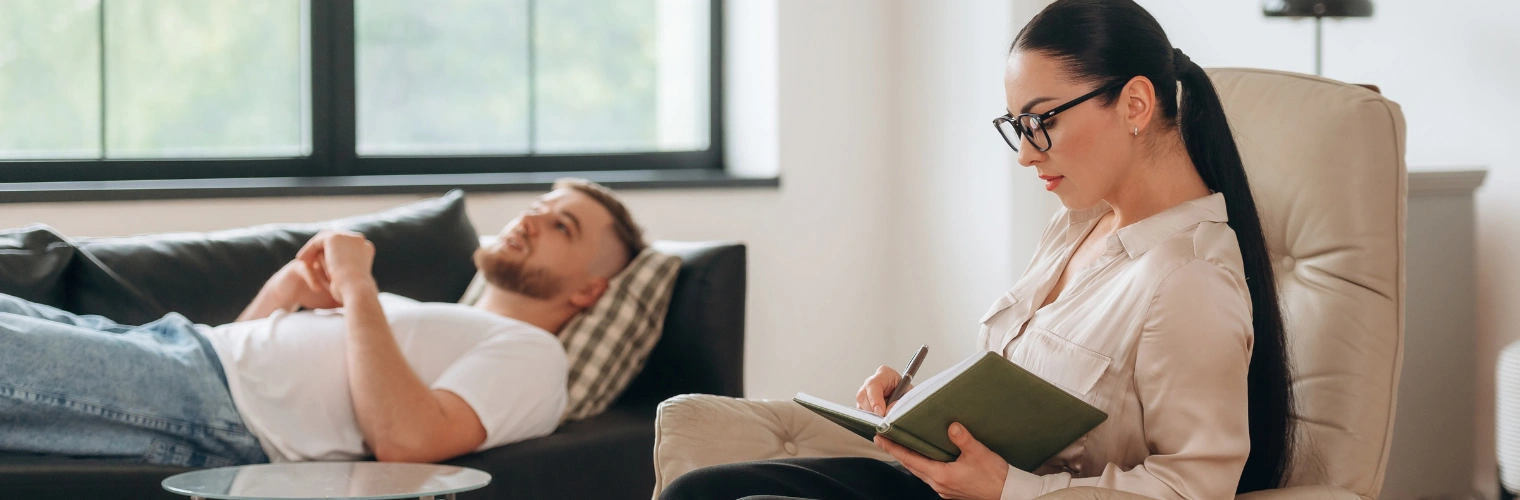 Image of a therapist and patient in a supportive residential treatment setting surrounded by nature at Ingrained Recovery Image of a therapist and patient in a supportive residential treatment setting surrounded by nature at Ingrained Recovery