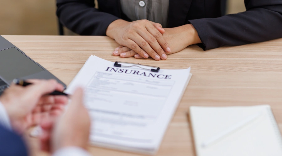 Image of an insurance card representing the difference between in-network and out-of-network treatment coverage