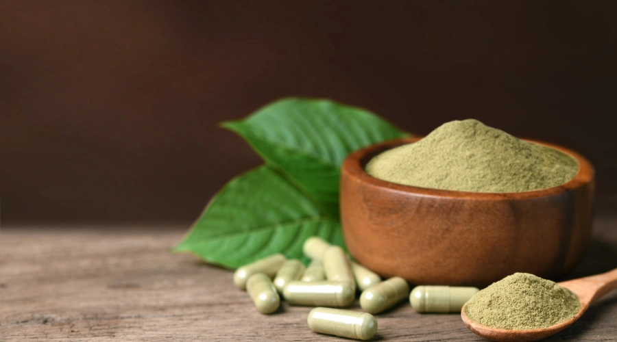 Image of kratom powder and products representing warning signs and red flags for relapse risk in recovery