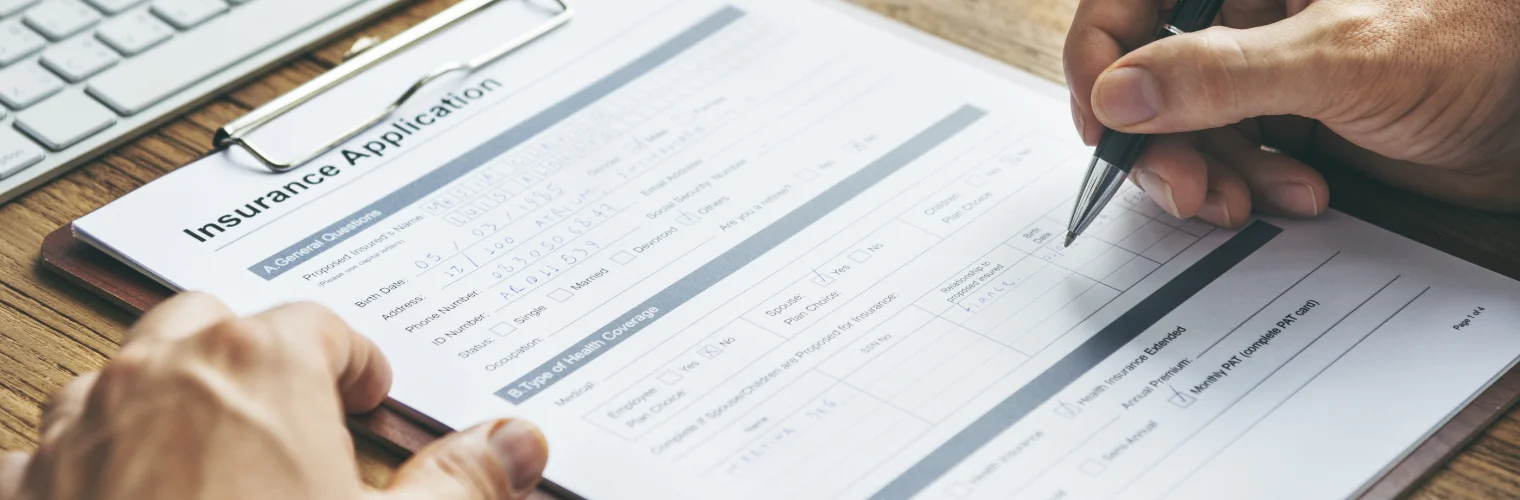 Image of an administrative specialist reviewing clinical documentation for prior authorization and medical necessity Image of an administrative specialist reviewing clinical documentation for prior authorization and medical necessity